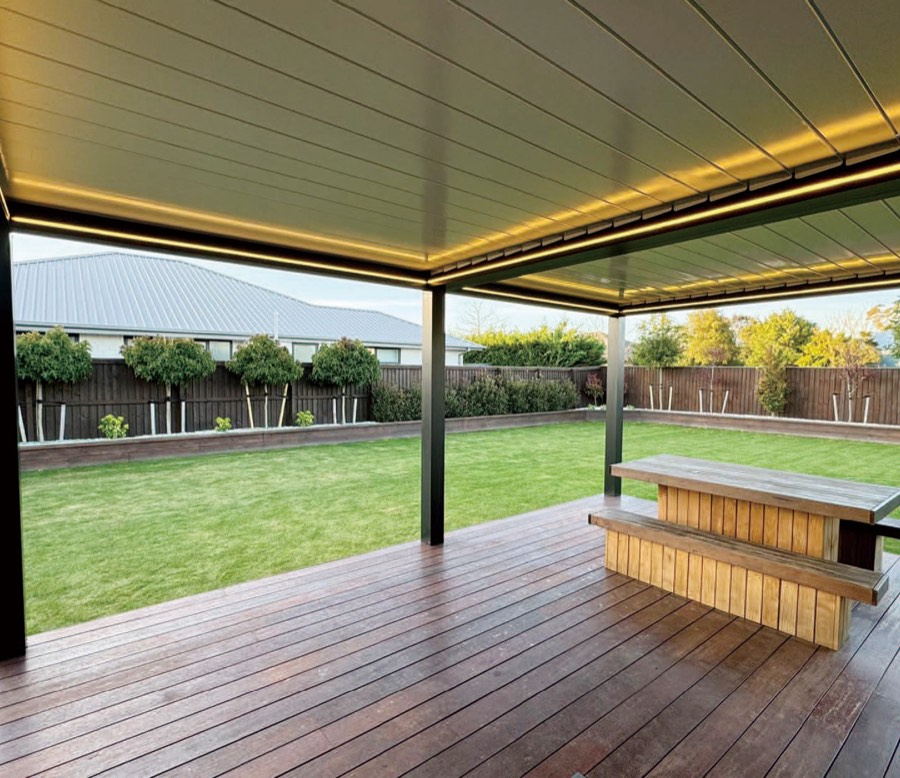 Motorised louvre-roof pergola over a New Zealand deck.